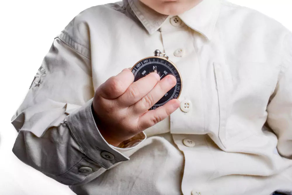 Man holding a barometer to check atmospheric pressure