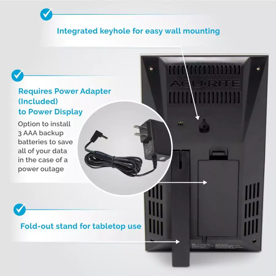 AcuRite weather monitoring display with wall mount, power adapter, and tabletop stand.