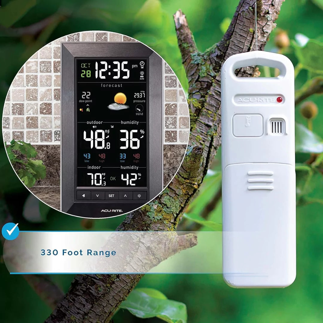 AcuRite outdoor weather sensor mounted on tree branch with 330-foot wireless range.