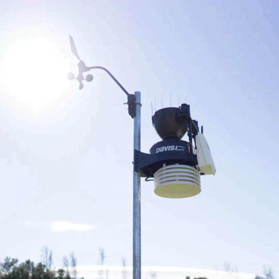 Davis vantage pro2 plus weather monitoring system with sensors and solar panel in daylight