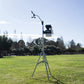 Outdoor setup of Davis Wireless vantage pro2 plus weather station on tripod stand in grassy field
