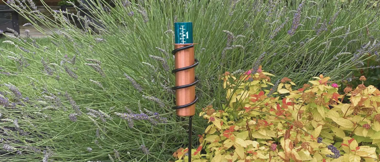 Load video: Video demonstration of how solid copper rain gauge works.