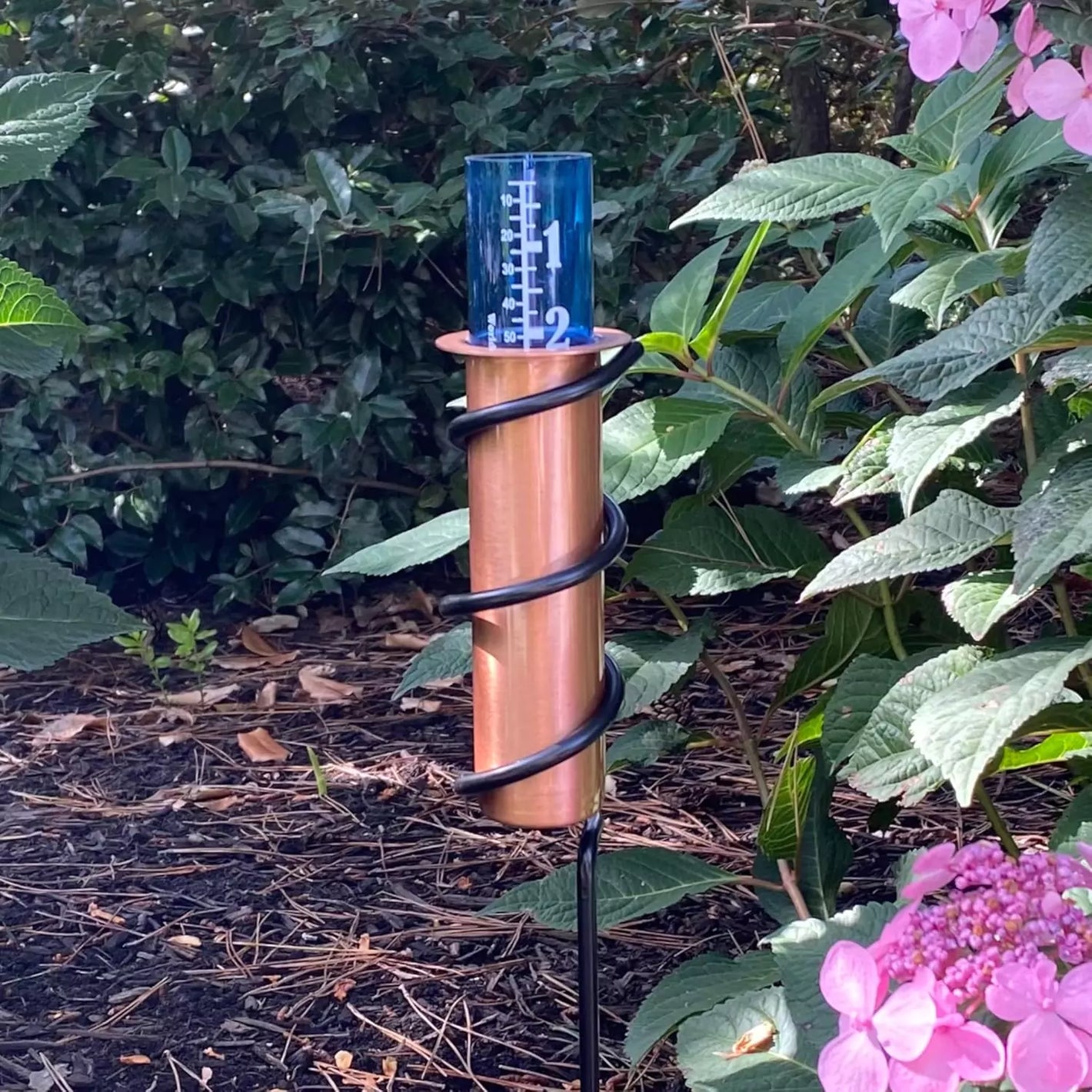 Worlds coolest solid copper rain gauge